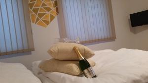 A bed or beds in a room at Sentami