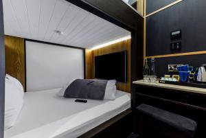 Postel nebo postele na pokoji v ubytování The Z Hotel Holborn