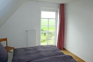 Postel nebo postele na pokoji v ubytování Seetuun Hoff - Fewo 2