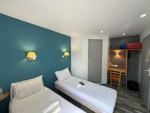 Postel nebo postele na pokoji v ubytování Fasthotel Avignon Nord Le Pontet