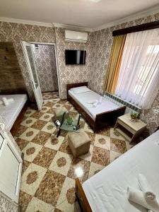 Styopa Hotel客房内的一张或多张床位