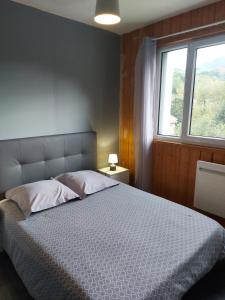 Postel nebo postele na pokoji v ubytování chez eric et isabelle