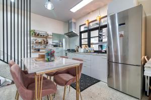 Kuchyň nebo kuchyňský kout v ubytování Rattana House Homestay