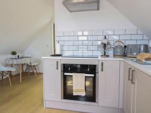 Η κουζίνα ή μικρή κουζίνα στο The Loft +12 φωτογραφίες