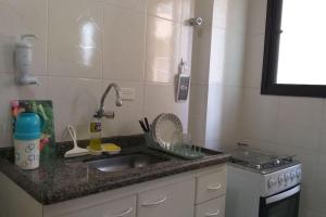 Dapur atau dapur kecil di Apê beira-mar -Ar condicionado-Wi-fi-Vaga de garagem coberta +83 gambar