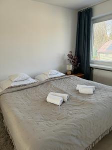 Postel nebo postele na pokoji v ubytování Apartamenty Cud Miód