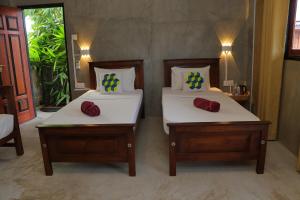 Postel nebo postele na pokoji v ubytování Negombo The Nature Villa and Cabanas