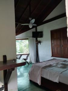 Postel nebo postele na pokoji v ubytování Pousada Canto Da Lua - Macacos