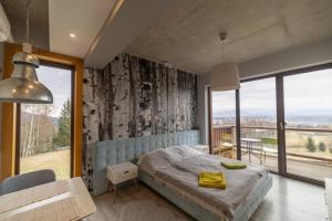 Postel nebo postele na pokoji v ubytování Widokowa Osada + 37 fotografií