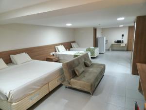 Ένα ή περισσότερα κρεβάτια σε δωμάτιο στο Suíte Vista Mata Atlântica - Vista Azul +22 φωτογραφίες