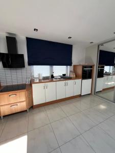 Kuchyňa alebo kuchynka v ubytovaní S&M Villa Kolobrzeg