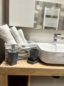 a bathroom counter with a sink and a mirror at IL BALCONCINO di GR in Fondi