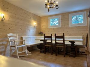 a dining room with a table and chairs at B&B Relief in Possagno +19 photos