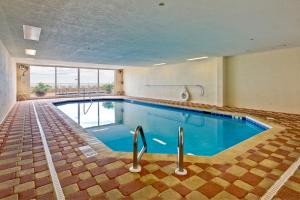 a large swimming pool in a hotel room at The Enclave 606 in Orange Beach