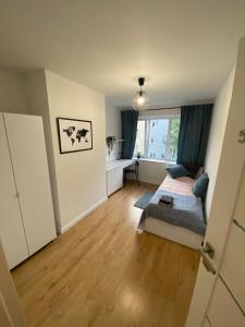 Posteľ alebo postele v izbe v ubytovaní Matejki rooms