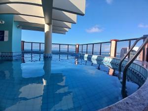 Flat Brasil Tropical by Escala Imóveis