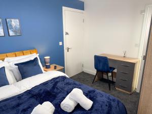 Ένα ή περισσότερα κρεβάτια σε δωμάτιο στο Napier Retreat Ensuite Rooms