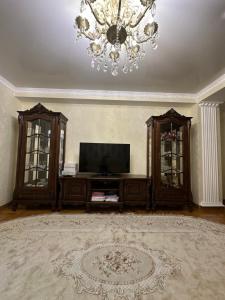 TV a/nebo společenská místnost v ubytování InaHome