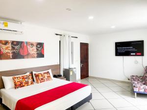 Voodi või voodid majutusasutuse Hotel Plaza Manfortt toas