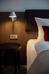 Voodi või voodid majutusasutuse bigBOX ALLGAEU Hotel toas