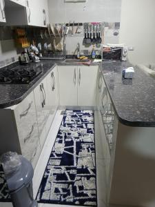 Kuchyň nebo kuchyňský kout v ubytování Apartment Hossam 2 - Hurghada