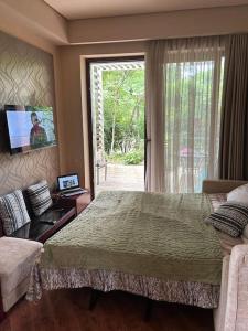 Postel nebo postele na pokoji v ubytování Dreamland Oasis Private garden