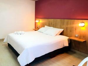 Katil atau katil-katil dalam bilik di Hotel Divaca