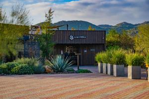 a building with plants in front of it at OJO AZUL RESORT in Valle de Guadalupe +17 photos