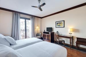 Postel nebo postele na pokoji v ubytování Hotel & Spa Real Badaguás Jaca