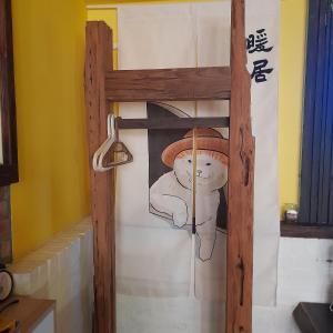 a painting of a person with a hat on a wall at 兔窩很Chill in Yilan City +48 photos