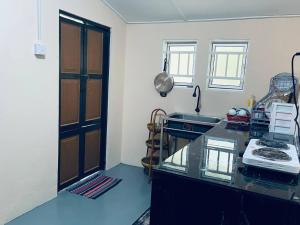 Kuchyň nebo kuchyňský kout v ubytování Inap Desa R'Sawit - Whole house + 37 fotografií