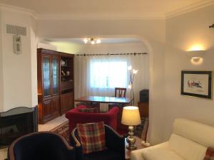 Posezení v ubytování Villa Lucie vue mer avec piscine privée en Algarve..