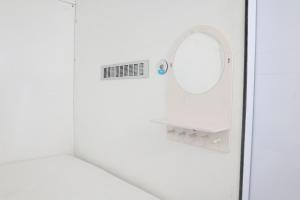 Fotografie z fotogalerie ubytování TAMU CAPSULE HOTEL v destinaci Kejayan