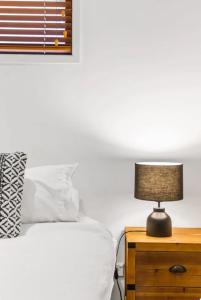 Ένα ή περισσότερα κρεβάτια σε δωμάτιο στο Studio 37 Byron Bay