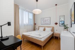 Posteľ alebo postele v izbe v ubytovaní Łobzowska 22 by Homeprime