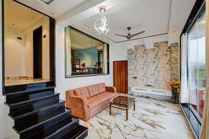 Posezení v ubytování The leaf resort Mahabaleshwar