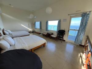 Letto o letti in una camera di Sun Motel