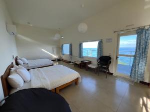 Letto o letti in una camera di Sun Motel