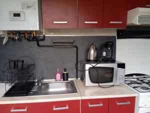 Kuchyň nebo kuchyňský kout v ubytování Appartement hyper centre 3 Lorient
