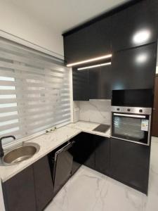 Kuchyň nebo kuchyňský kout v ubytování Gorana 1 + 2 fotografie