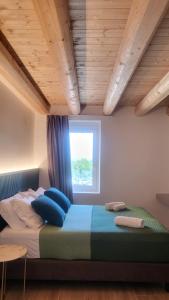 Ένα ή περισσότερα κρεβάτια σε δωμάτιο στο Casa Belvedere - ENJOY HOLIDAY +33 φωτογραφίες