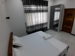 Postel nebo postele na pokoji v ubytování Alps Villa