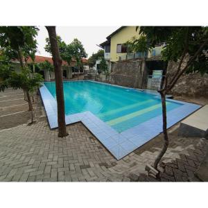 Бассейн в Villa Asia Jaya RedPartner или поблизости