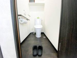 4F Guest House NETOMARI 西九条駅から徒歩2分にあるバスルーム