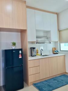 Bayu Temiang Residensi的厨房或小厨房