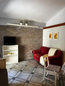 TV a/nebo společenská místnost v ubytování APIJA Studio + 17 fotografií