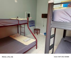 Ένα ή περισσότερα κρεβάτια σε δωμάτιο στο Resort Iman D'Semungkis