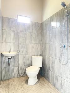 Ένα μπάνιο στο Capital Panorama Guest House Syariah