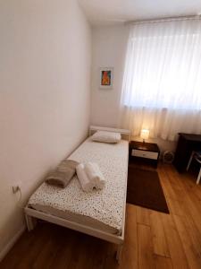 Postel nebo postele na pokoji v ubytování Fabulous Apartment "Central Sun" with Balcony and Park View