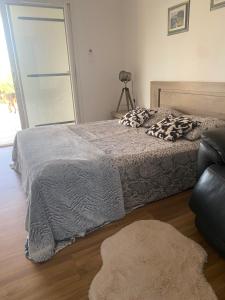 Ένα ή περισσότερα κρεβάτια σε δωμάτιο στο Villa Loredana
